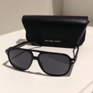 Aviator style Michael Kors sunglasses for men. Never been worn, mint condition.